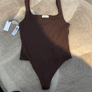 Dark brown square neck bodysuit w/ a high rise thong. Never worn. Buttery soft.